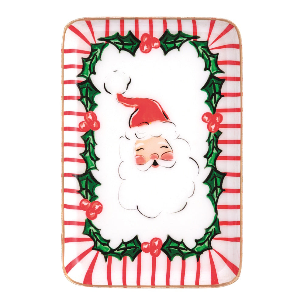 Rectangular metal Christmas tidbit plate featuring a Santa face framed by a holly wreath and red stripes.