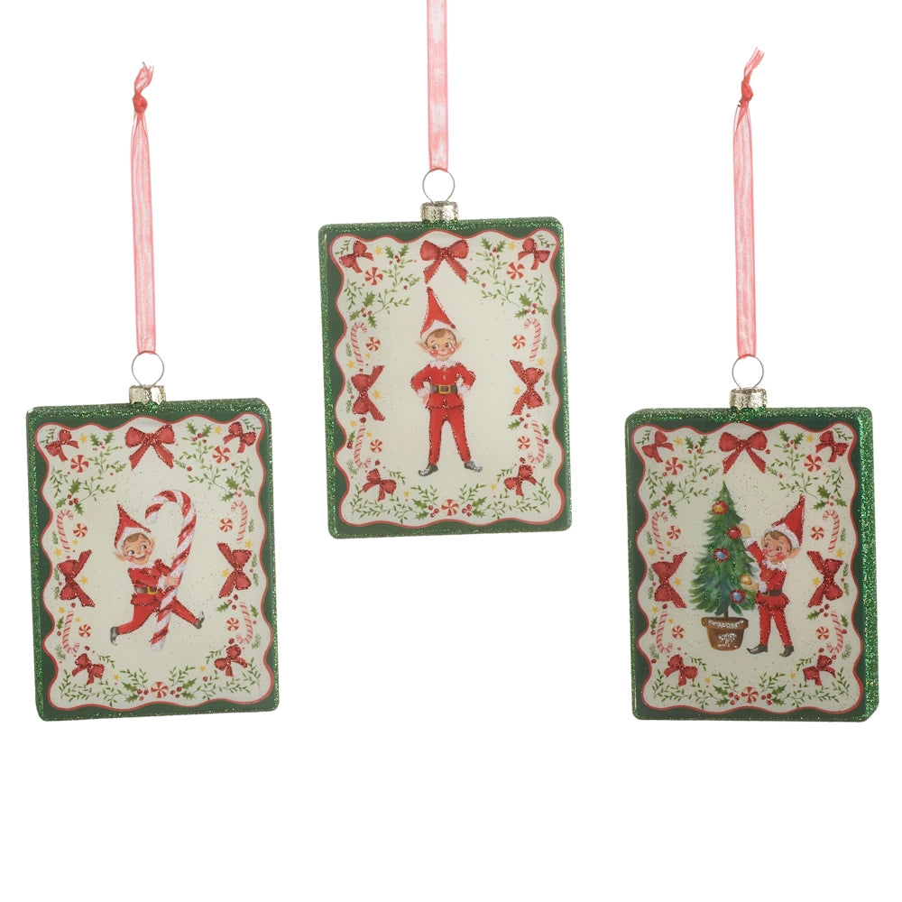Front view of three rectangular glass Christmas ornaments featuring vintage elves with candy canes, trees, and bows.