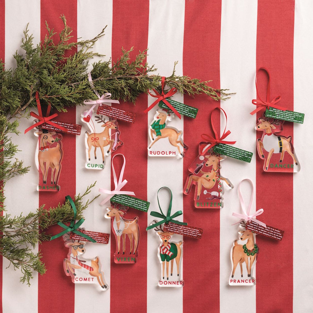 Set of illustrated Santa's reindeer Christmas ornaments displayed on red and white striped background.
