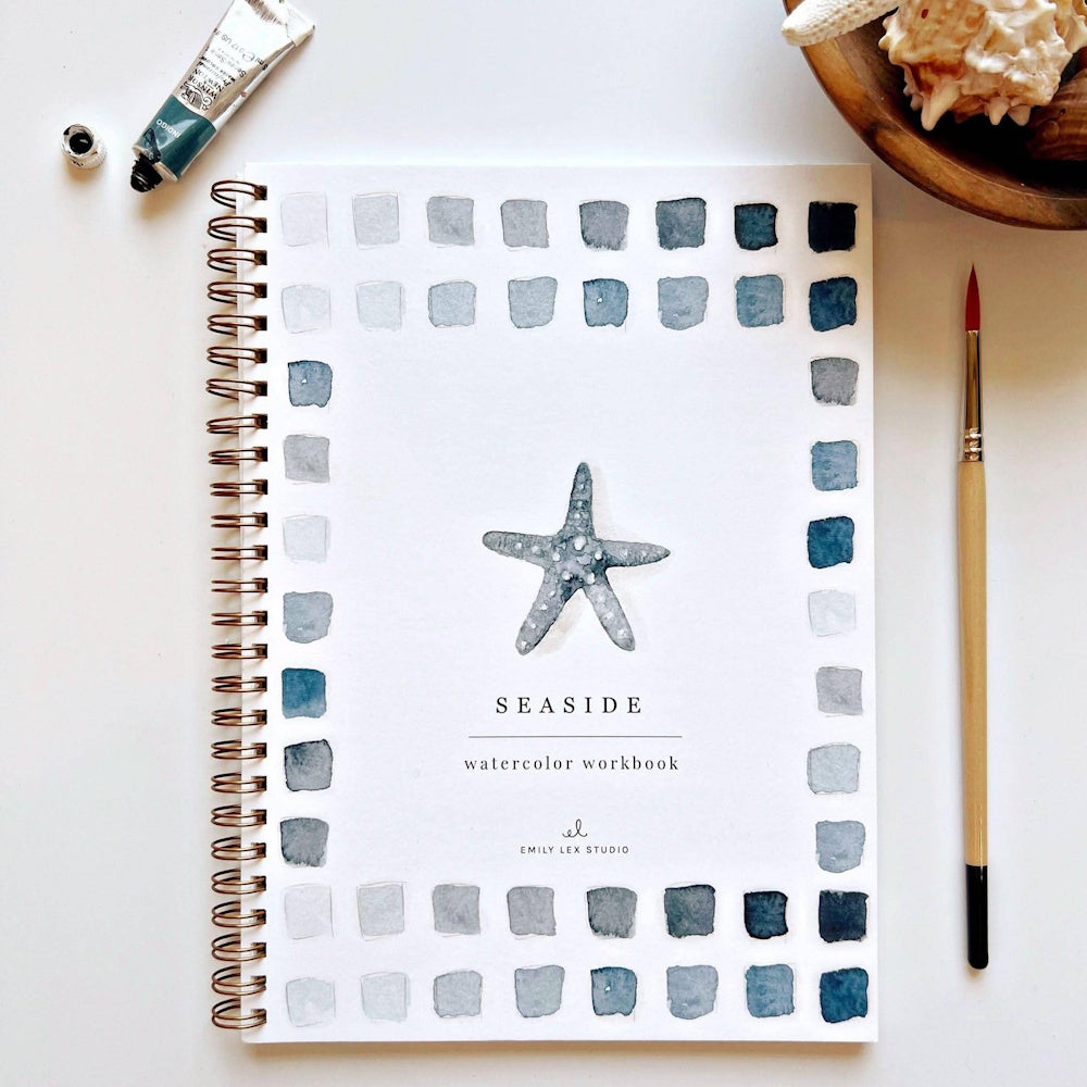 Seaside Watercolor Workbook by Emily Lex Studio with starfish illustration and blue paint swatches.