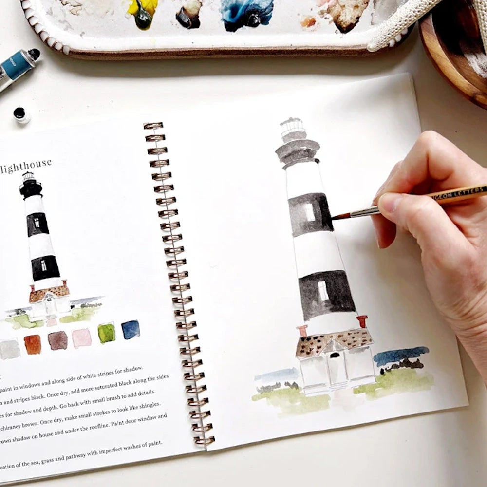 Watercolor lighthouse workbook page with hand painting black stripes and seaside tutorial instructions.
