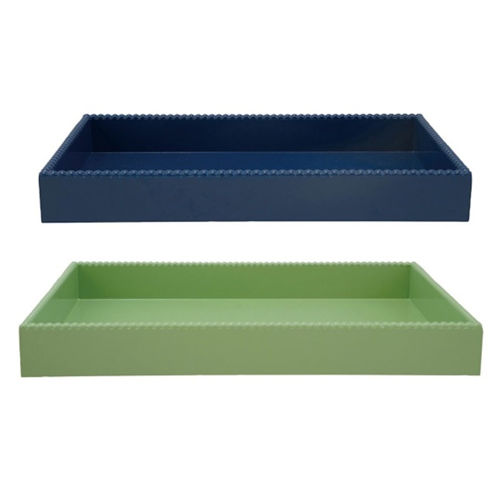 Two rectangular decorative trays, one navy blue and one sage green, with beaded hobnail edges on a white background.