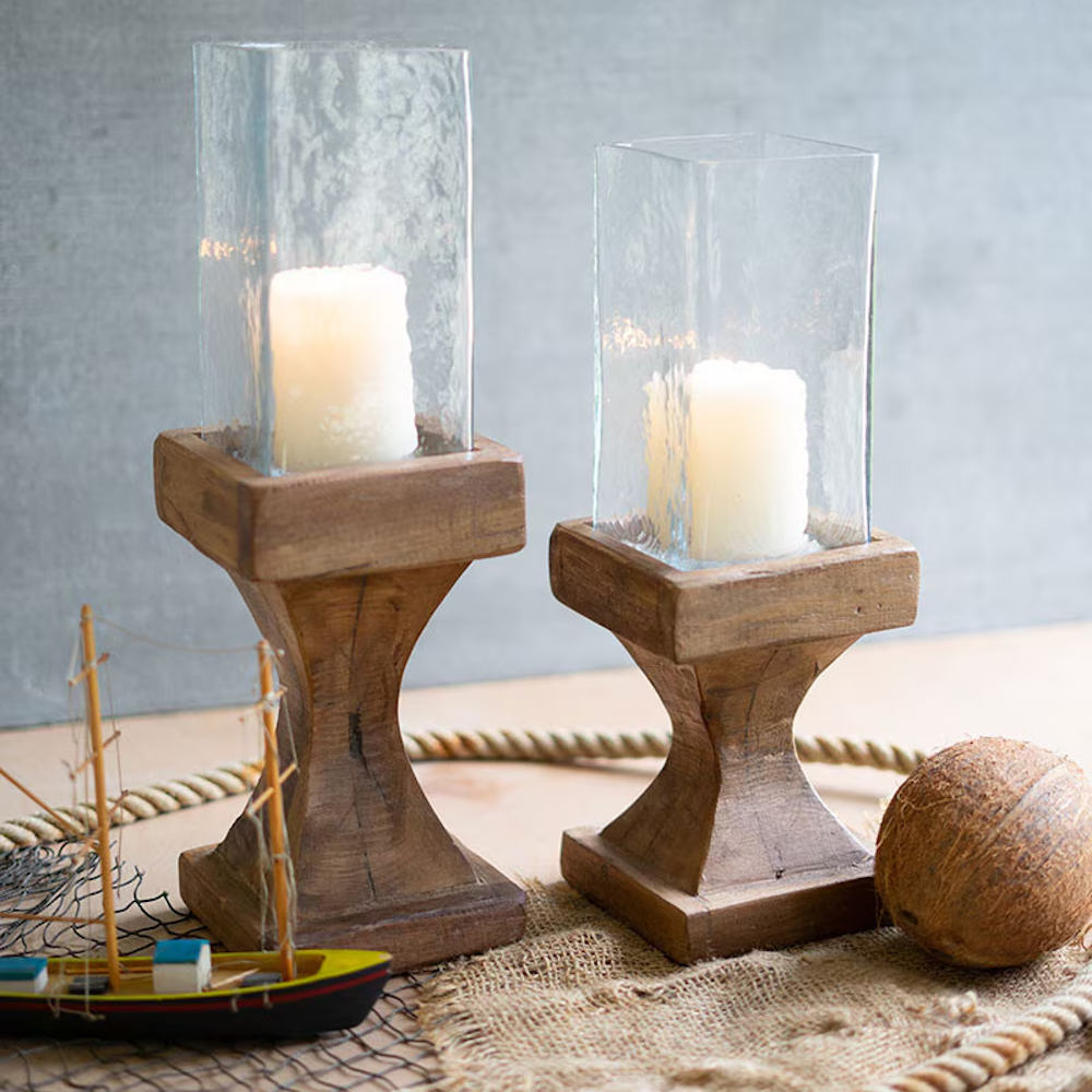 Set of two square glass hurricane candle holders with pedestal recycled wood bases.