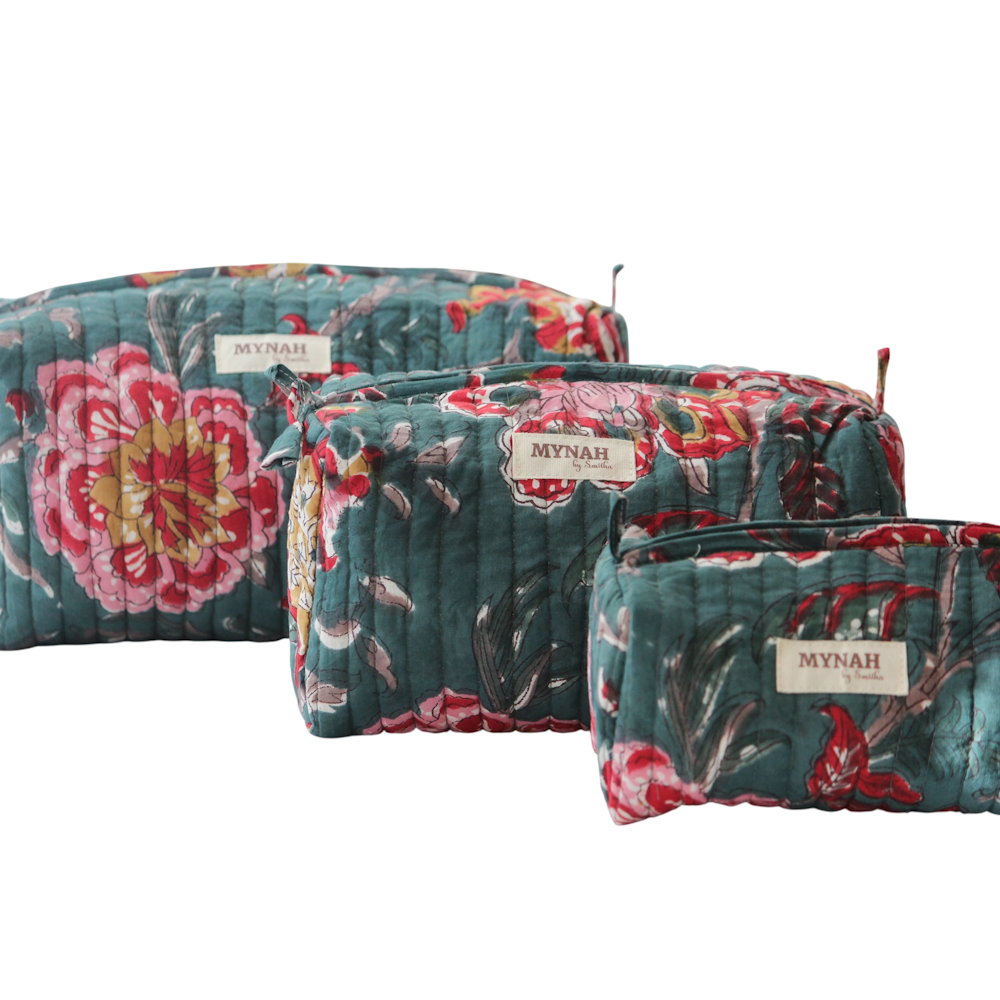 Set of 3 teal quilted floral zipper pouches by Mynah.