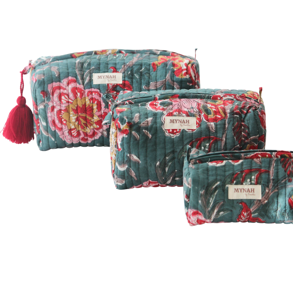 Set of 3 teal quilted floral zipper pouches by MYNAH. Various sizes with a red tassel accent.