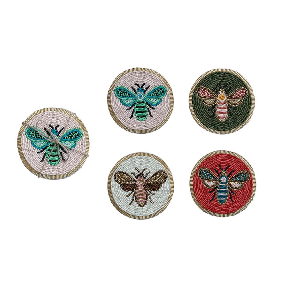 Set of 4 round beaded glass coasters featuring colorful insect bee designs on pink, green, white, and red.