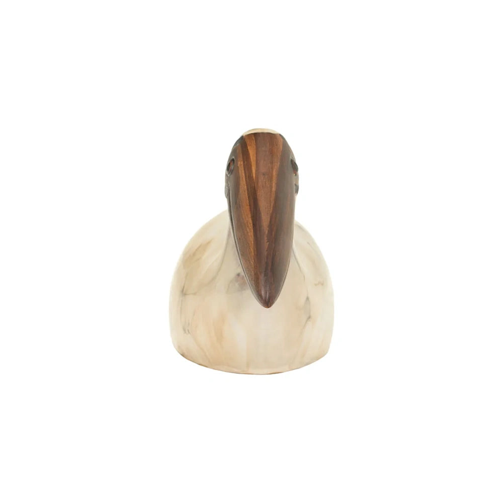 Front view of a smooth, rounded bird sculpture with a dark wood beak and light marble-like body.