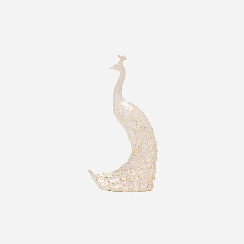 Glossy off-white ceramic peacock figurine with detailed feather texturing on a plain white background.