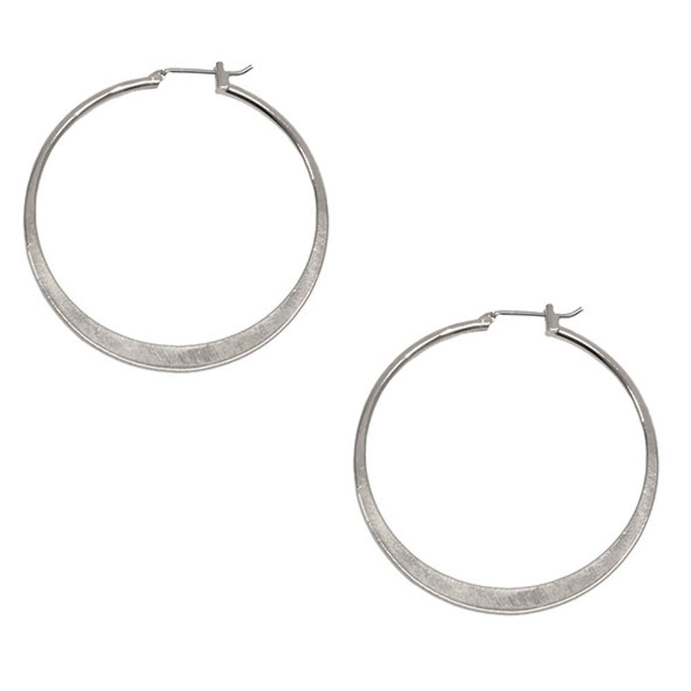 A pair of large, flat silver hoop earrings with a brushed metallic finish and latch-back closures on a white background.