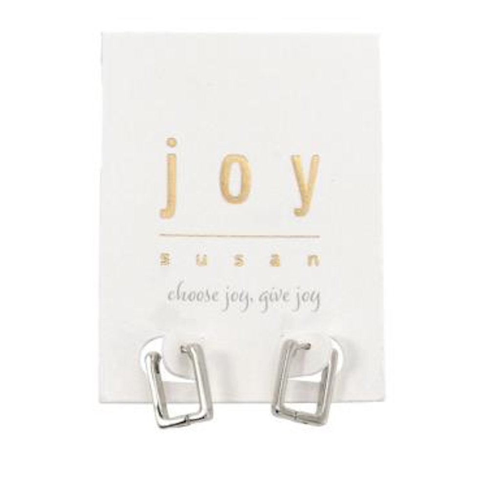 Silver rectangle huggie hinge hoop earrings displayed on a white Joy Susan jewelry card with gold lettering.