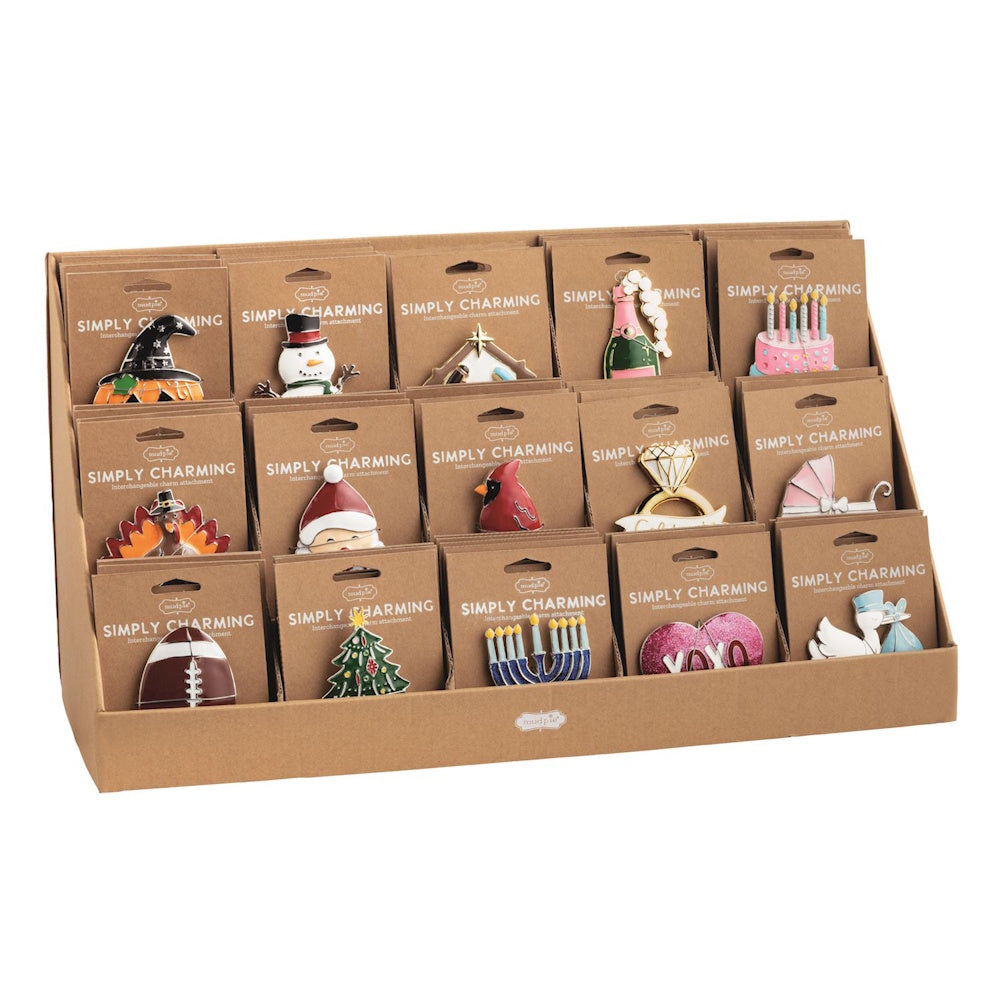 Mud Pie Simply Charming interchangeable charms counter display with seasonal holiday designs.