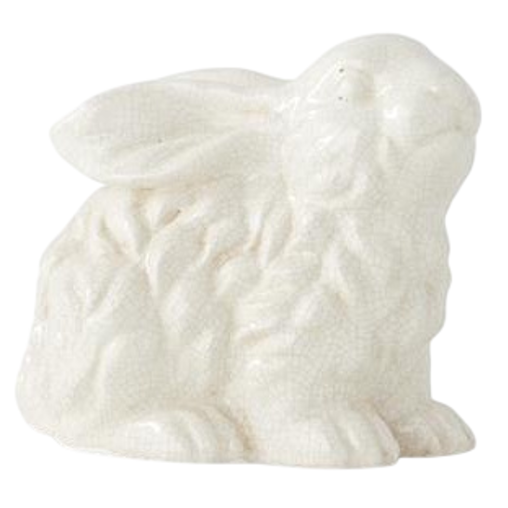 White glazed terracotta bunny figurine with a textured finish and upright ears, isolated on a white background.