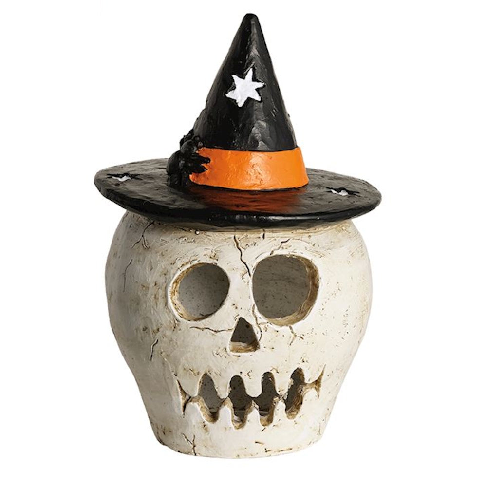Skull papier-mâché Halloween lantern wearing a black and orange witch hat.