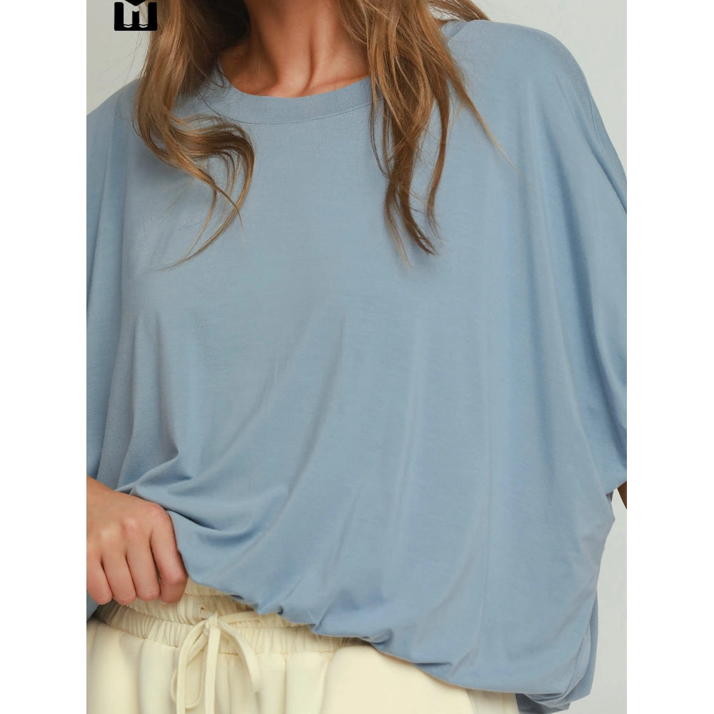 Slate blue loose-fit crewneck top with draped dolman sleeves and a bubble hem.