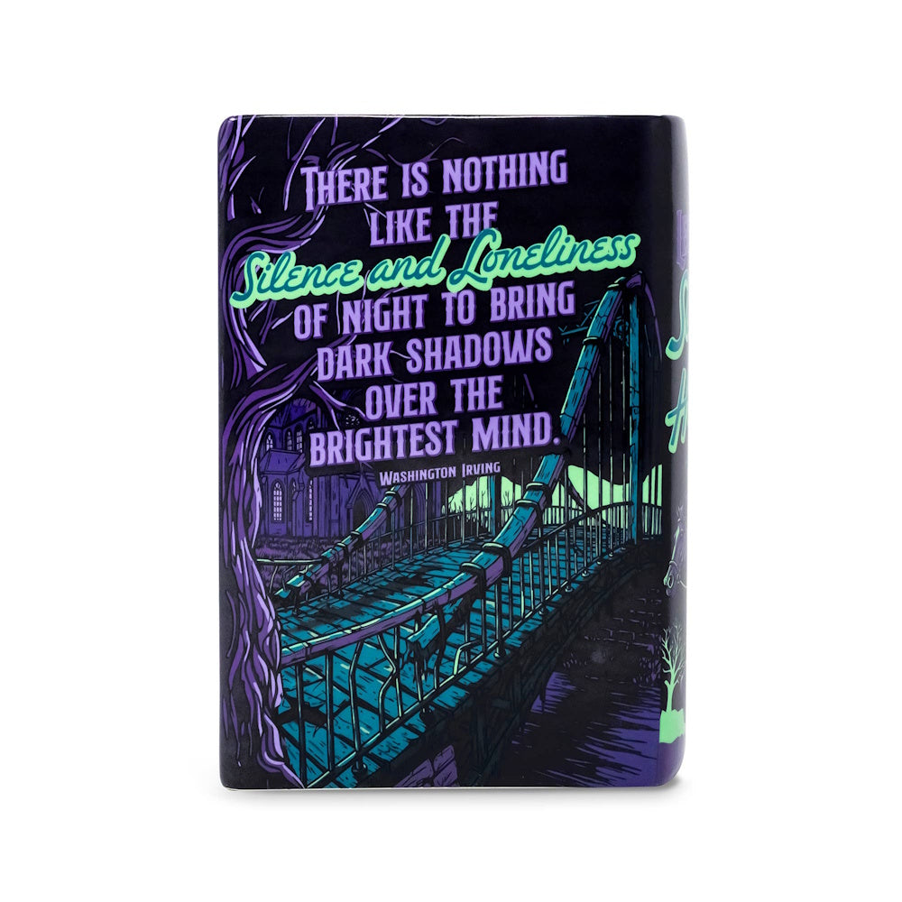 Back of a book-shaped vase featuring a spooky bridge scene and a Washington Irving quote.