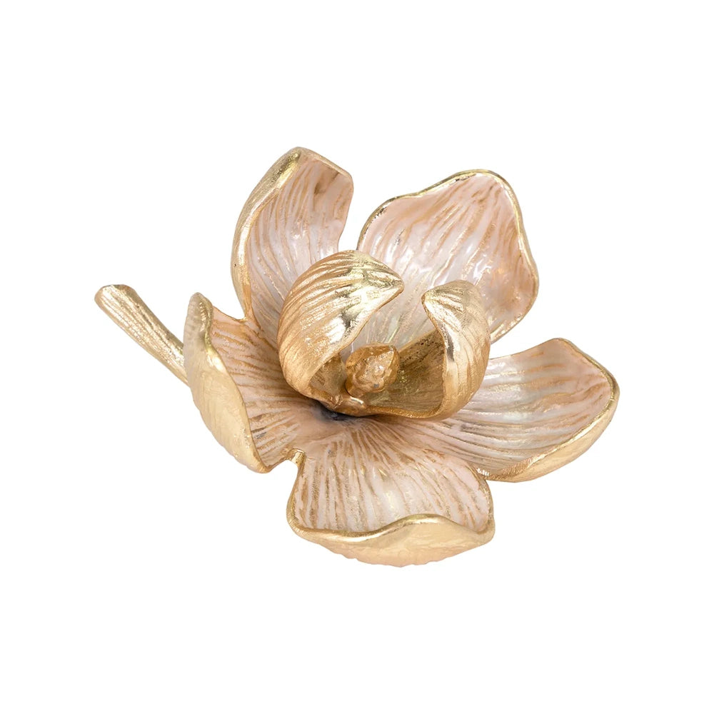 A gold and pale pink flower sculpture with metallic petals and a textured, glossy finish on a white background.