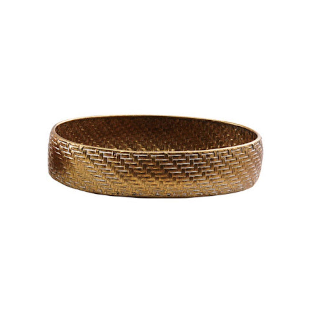 Small round gold woven metal tray with textured basket weave pattern on white background.