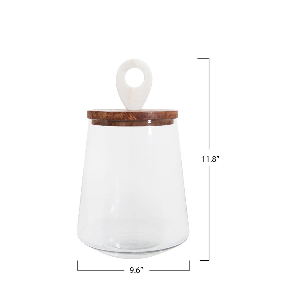A tapered glass jar with a wooden lid and a white marble ring handle, measuring 11.8" high and 9.6" wide.