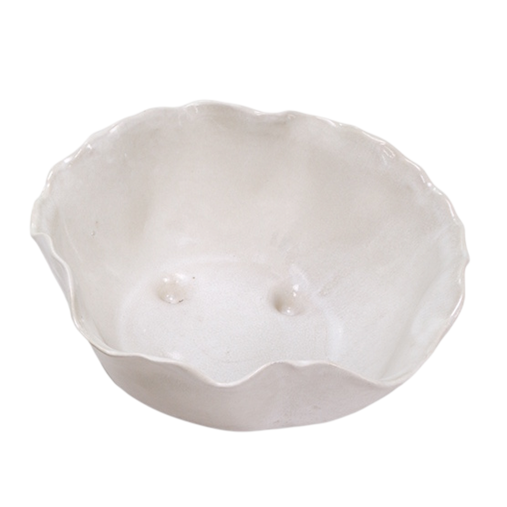 Small Magnus white ceramic bowl with organic wavy edges and a reactive glaze finish on a white background.