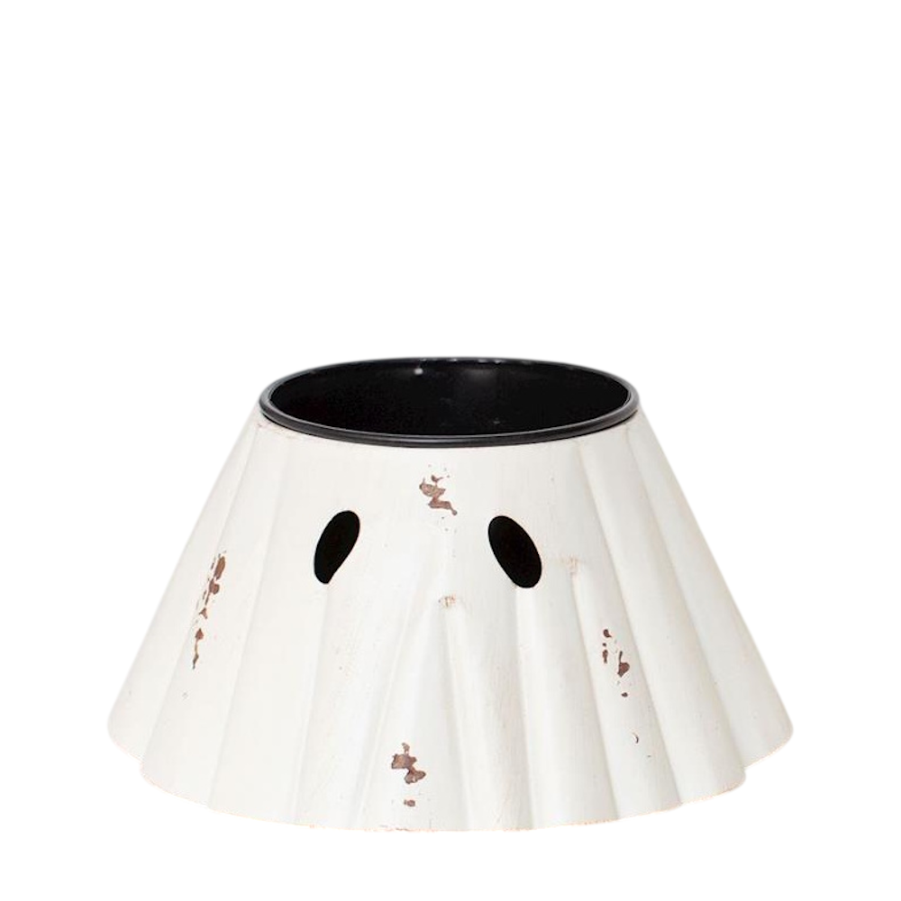 Distressed white ghost-shaped planter with black eye cutouts on a plain white background.