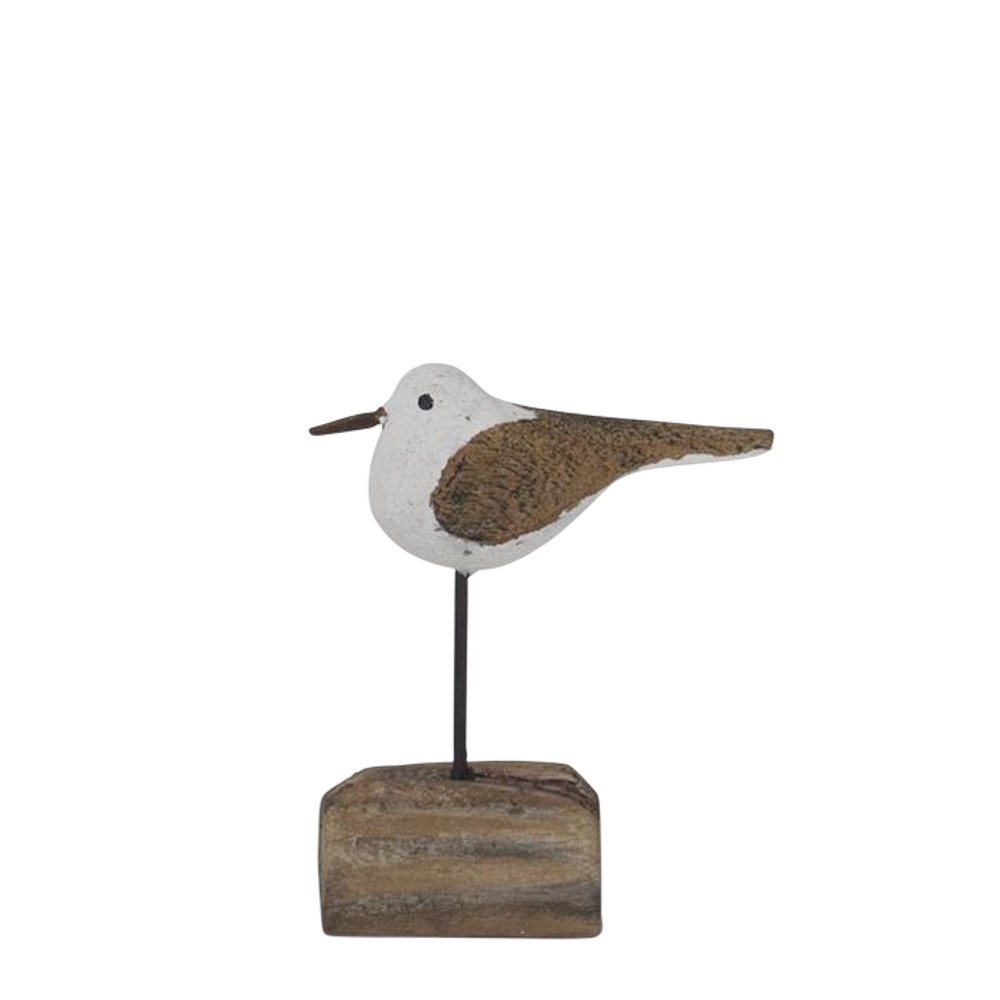 Handcrafted wooden seagull figurine on a driftwood base, nautical beach house decor.
