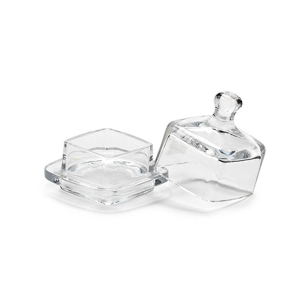 Small clear glass square butter dish shown open with its matching dome lid resting beside it.
