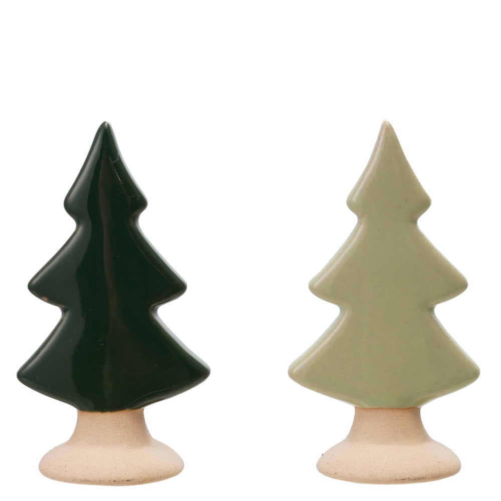 Two ceramic pine tree figurines, one dark green and one sage green, with unglazed tan bases.