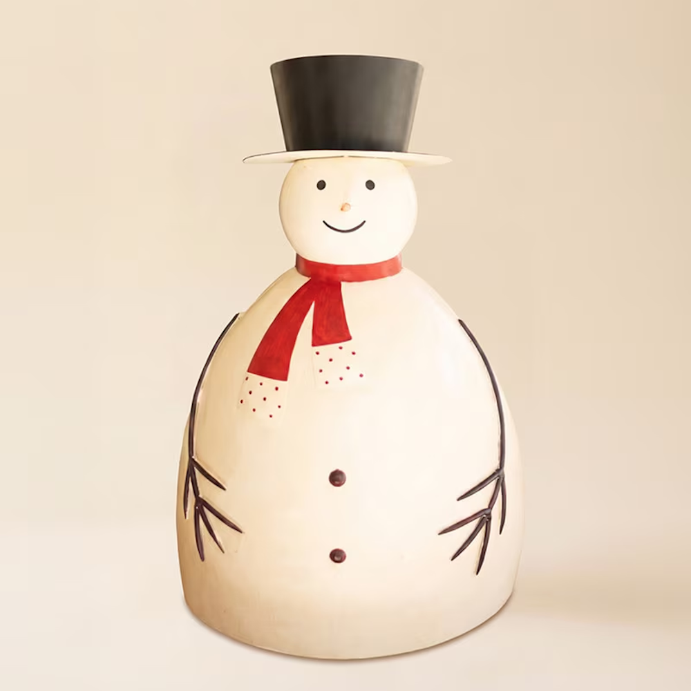 Large painted metal snowman sculpture with a top hat and red scarf against a plain background.