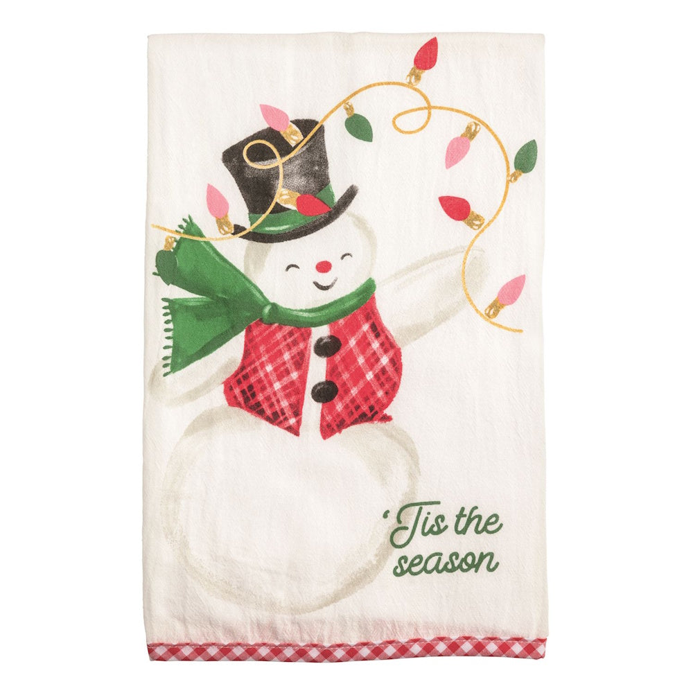 Festive towel featuring a cheerful snowman wrapped in colorful lights with "‘Tis the season" text.