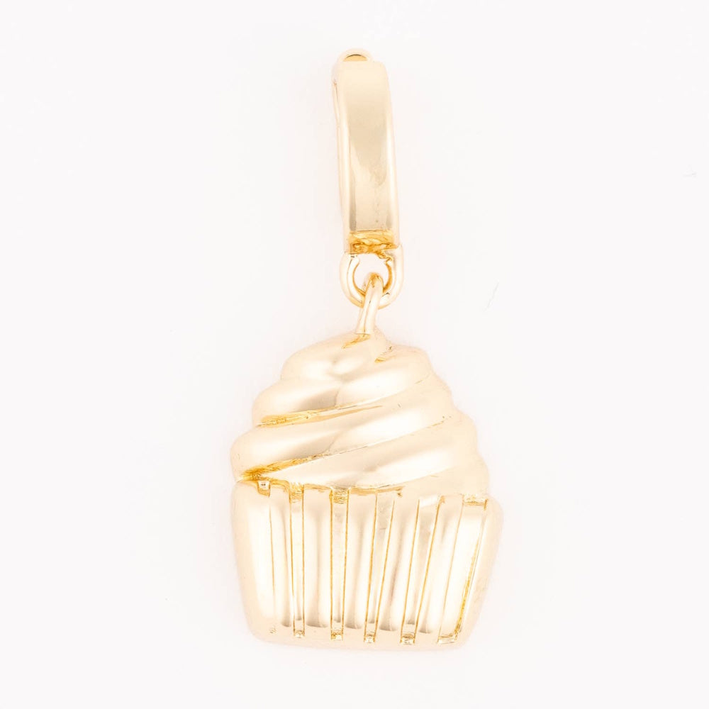 Gold cupcake charm with swirled frosting and a ribbed liner hanging from a smooth bail.