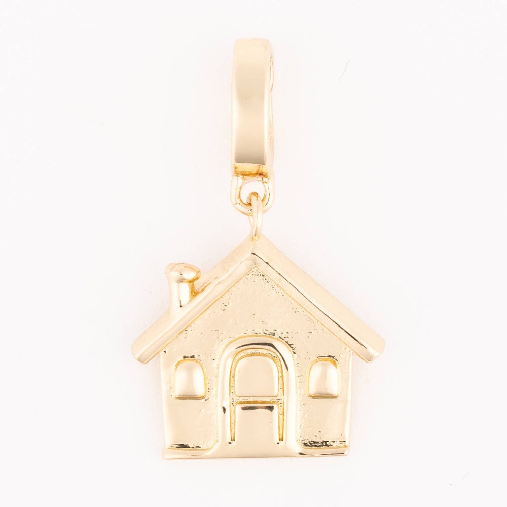 Gold house charm featuring a chimney, roof, and doorway hanging from a smooth bail.