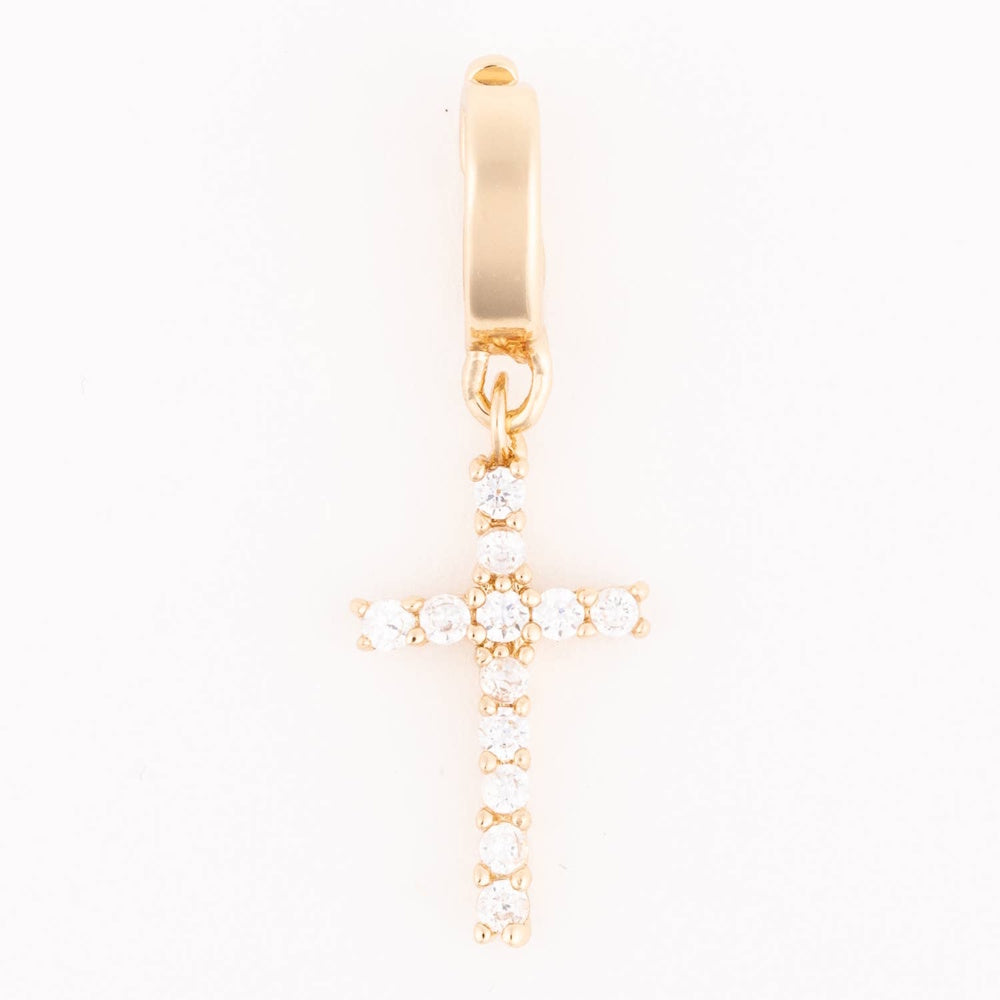 Gold cross charm embellished with clear sparkling crystals hanging from a smooth bail.
