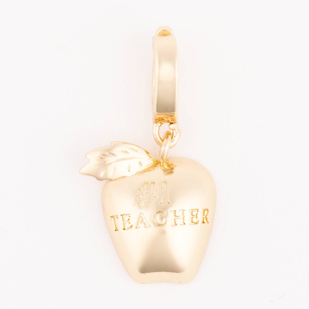 Gold apple charm engraved with "#1 TEACHER" hanging from a smooth bail.