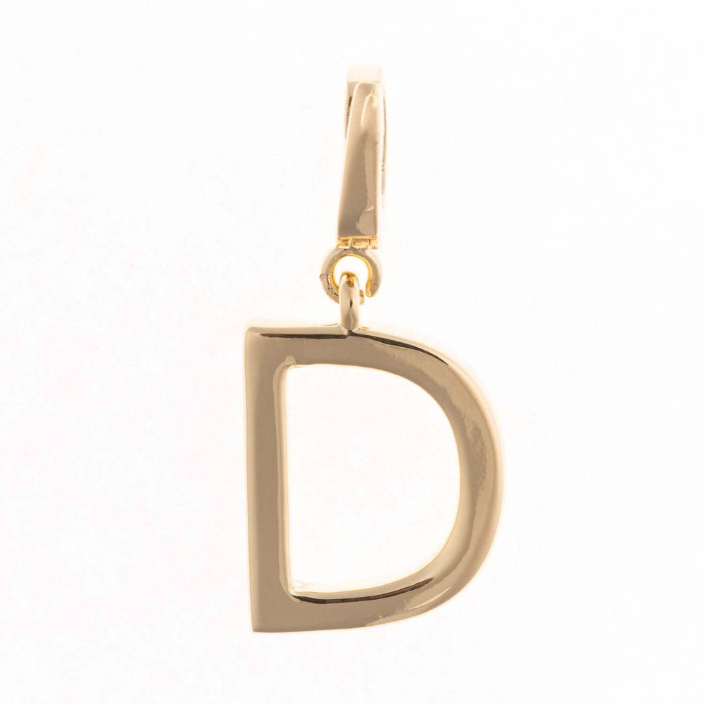 A polished gold pendant charm in the shape of the capital letter D on a plain white background.