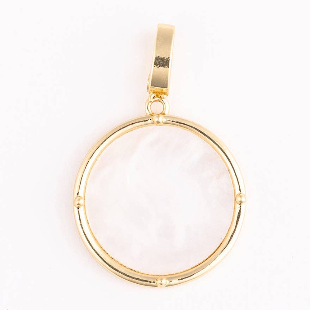 Elegant gold circular pendant with a white marble inlay, featuring four decorative gold studs on a plain white background.