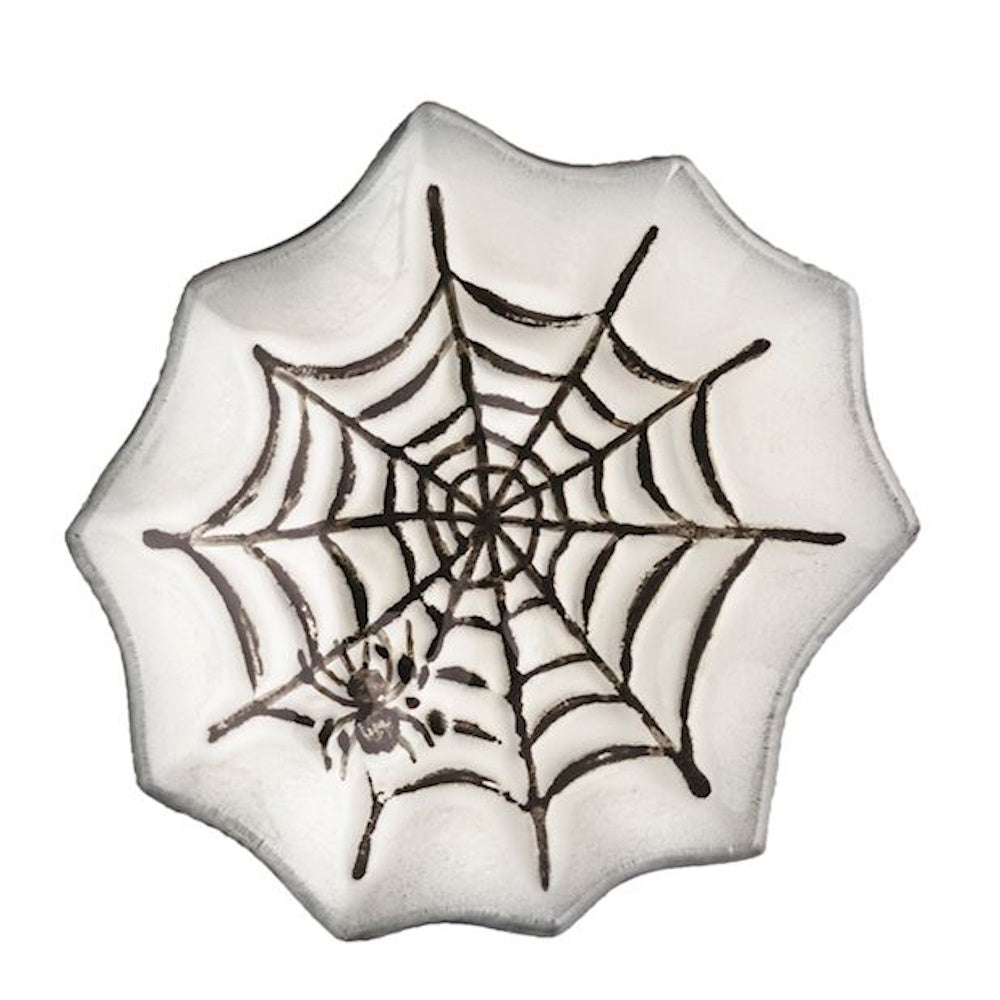 Spiderweb-shaped Halloween tidbit plate with a painted black web and spider design.