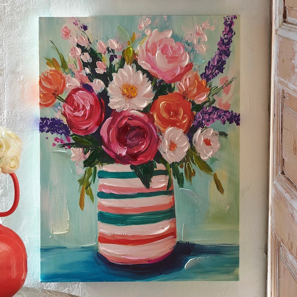 Impressionist painting of a colorful floral bouquet in a striped vase, featuring thick, textured brushstrokes.
