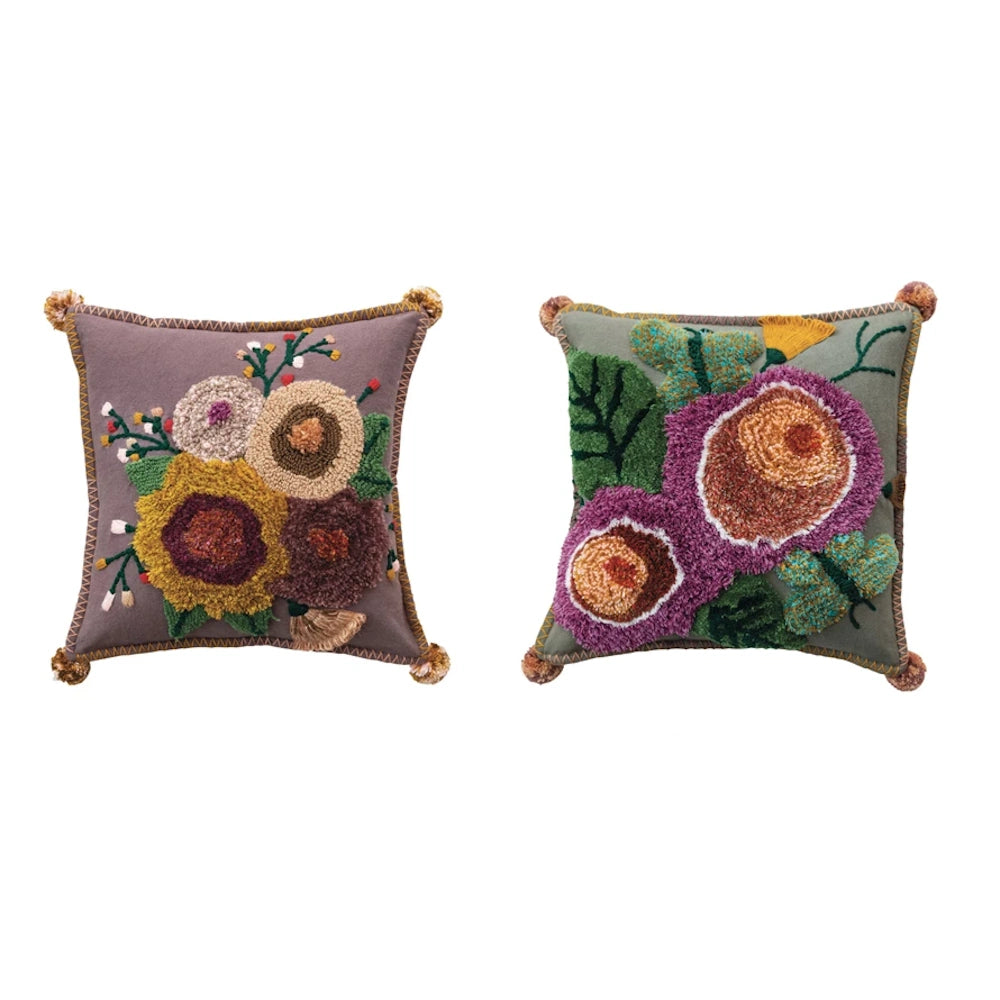Hand-embroidered floral throw pillows with tassels, bohemian home decor accents for sofa or bed styling.