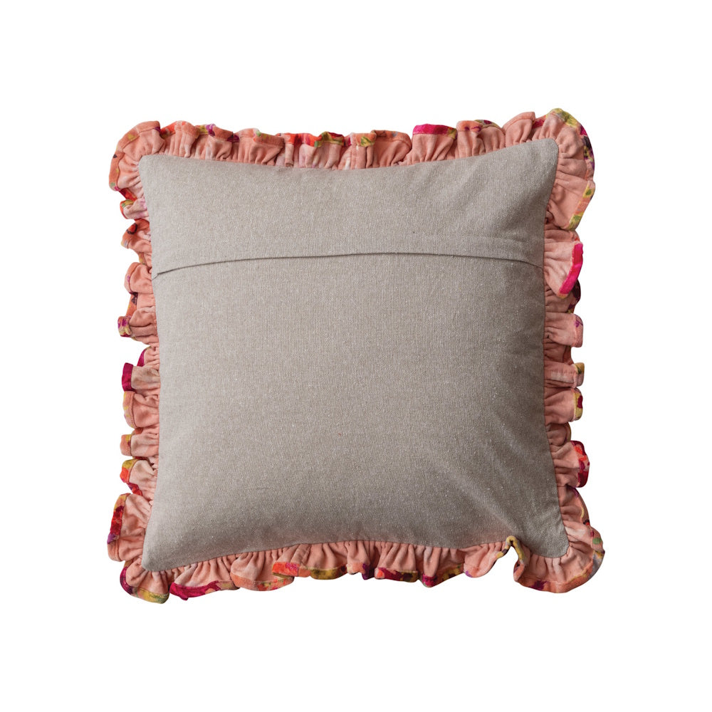Square canvas-backed pillow with a ruffled, pink-toned floral border and an envelope closure on a white background.