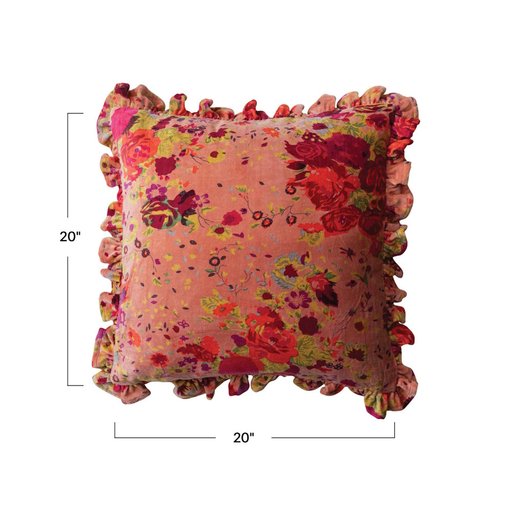 A square, pink floral velvet pillow with ruffled edges, with graphic text lines showing it is 20" by 20".