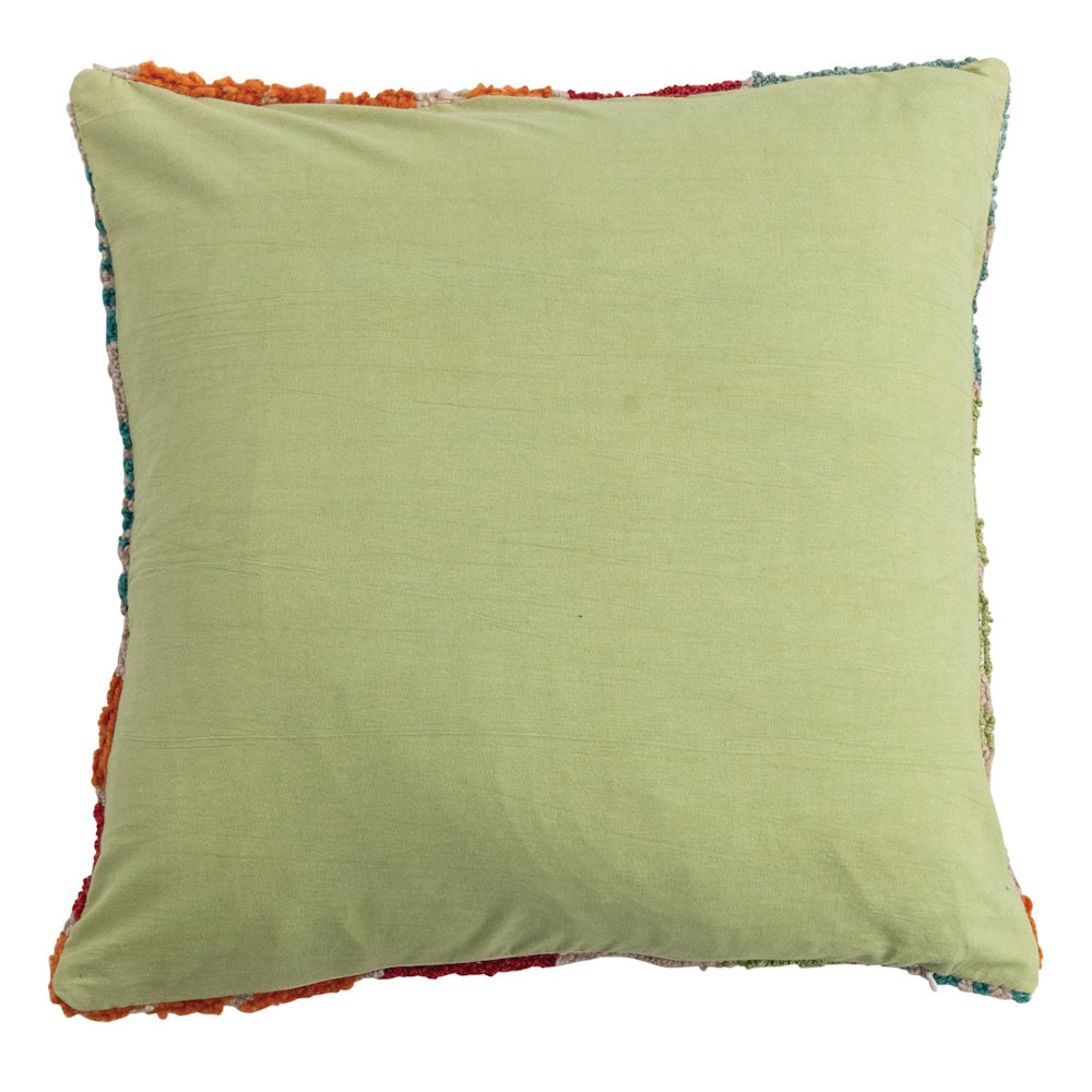 Back view of a square light green fabric indoor-outdoor pillow with colorful tufted flower edges on a white background.
