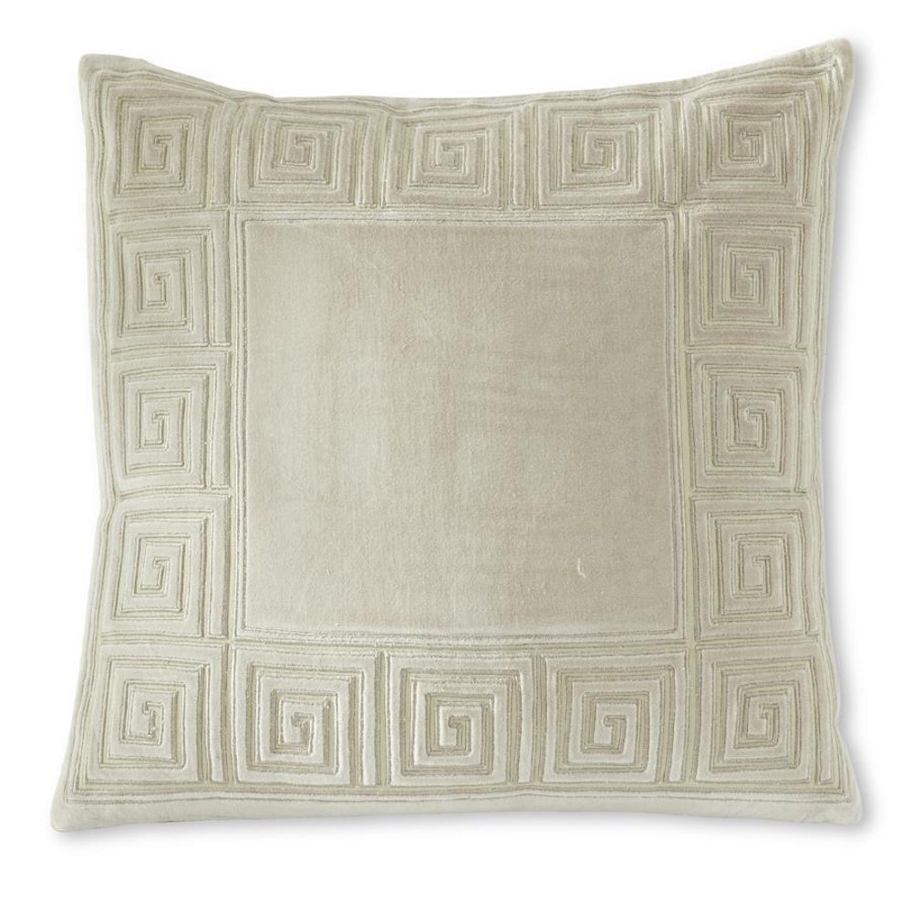 Square tan cotton velvet throw pillow featuring an embroidered Greek key border pattern on a cream background.