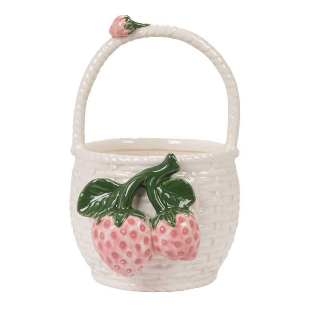 A ceramic woven basket vase with realistic strawberry clusters on the front and handle, set against a white background.