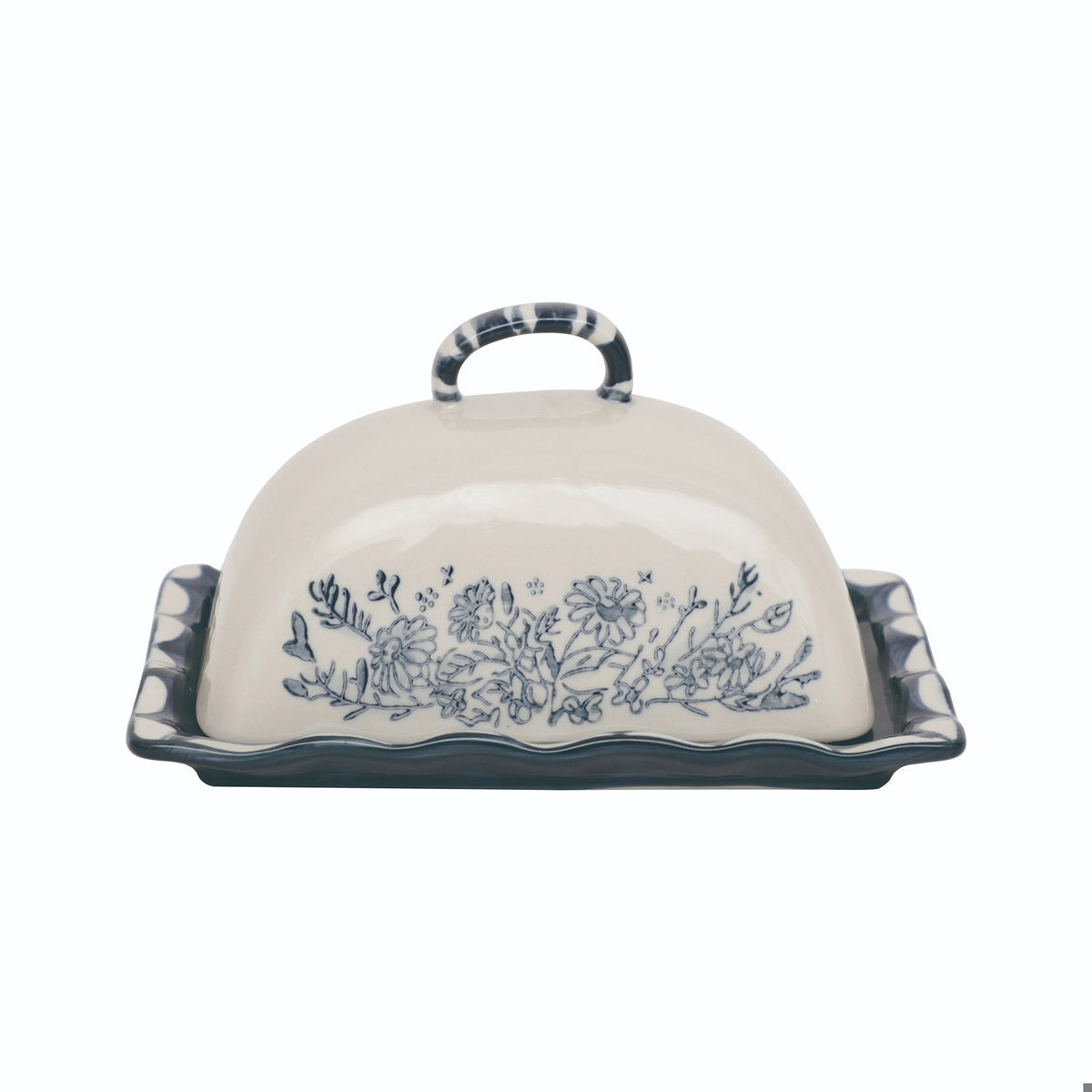Cream ceramic covered butter dish featuring blue floral illustrations, a looped handle, and a wavy-edged tray.