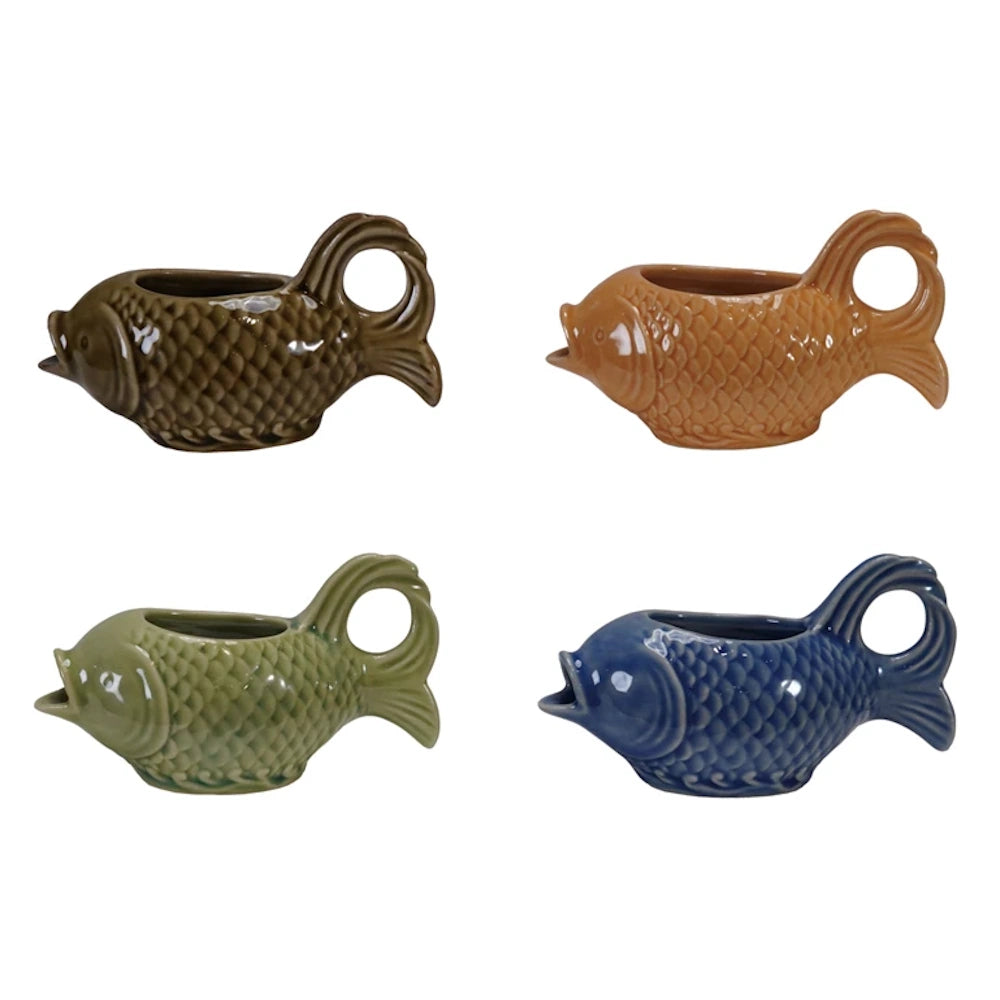 Set of 4 ceramic fish-shaped creamers in brown, orange, green, and blue with textured scales and tail handles.