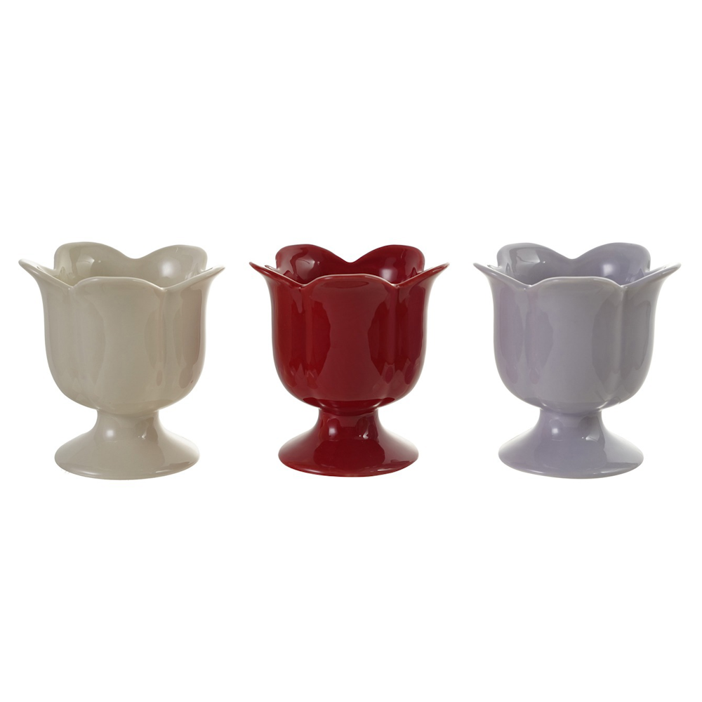 Trio of footed stoneware bowls shaped like tulip petals in cream, deep red, and soft lavender shades.
