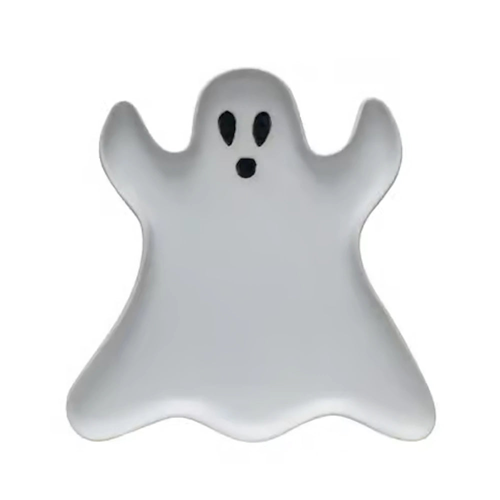 Matte white stoneware ghost-shaped plate with a black painted face on a white background.