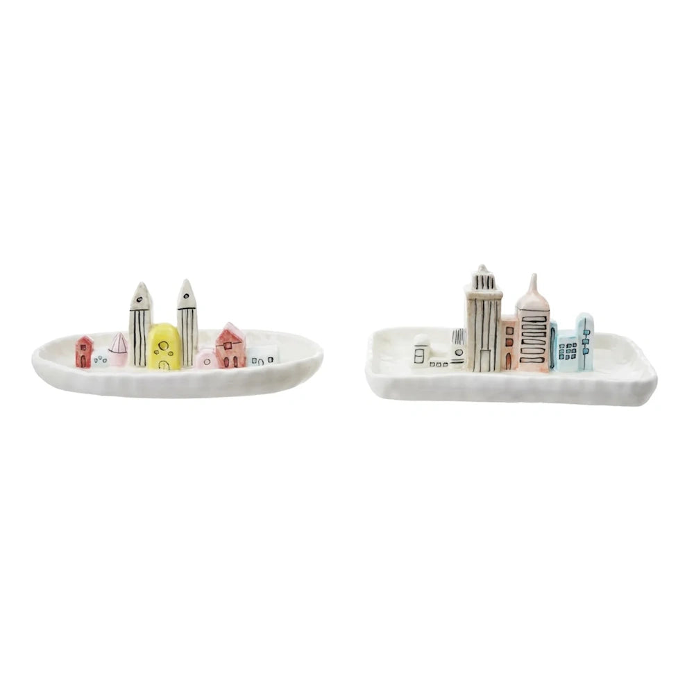 Two white ceramic trinket dishes featuring mini 3D colorful cityscape buildings.
