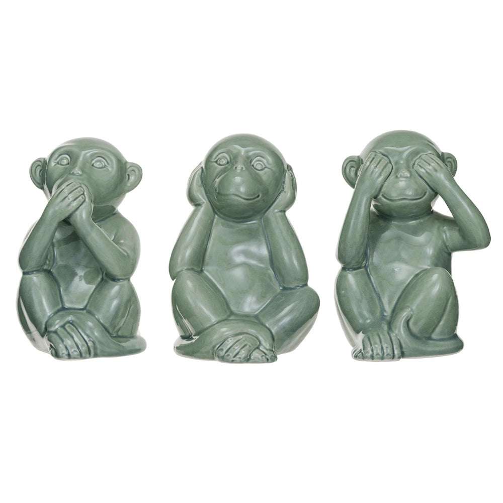 Green stoneware "See No Evil, Hear No Evil, Speak No Evil" monkey figurines, perfect for shelf or tabletop decor.