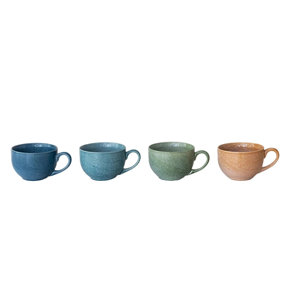 Set of four colorful stoneware mugs in blue, green, and tan. Rustic ceramic cups for coffee, tea, or soup.